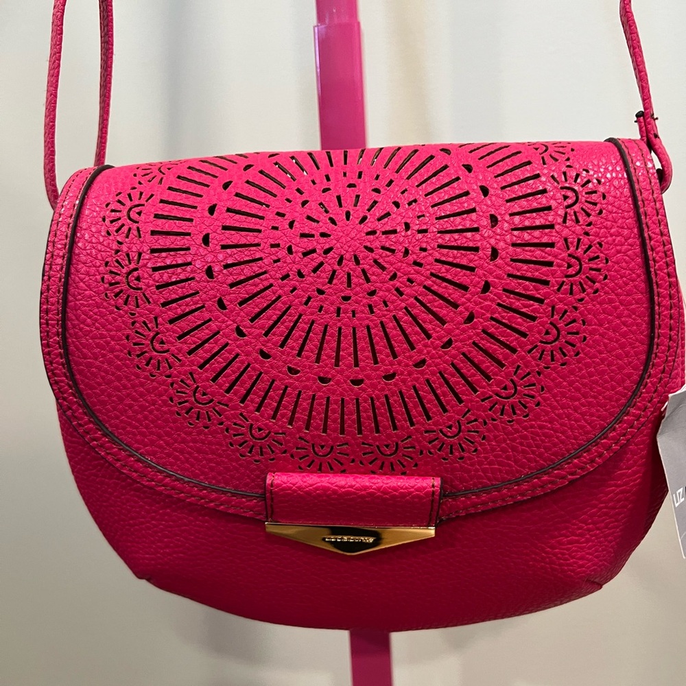 Liz Claiborne pink faux leather laser-cut design crossbody bag.